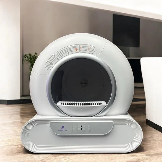 Witte FoneTex automatische kattenbak met opvangmat in huis
